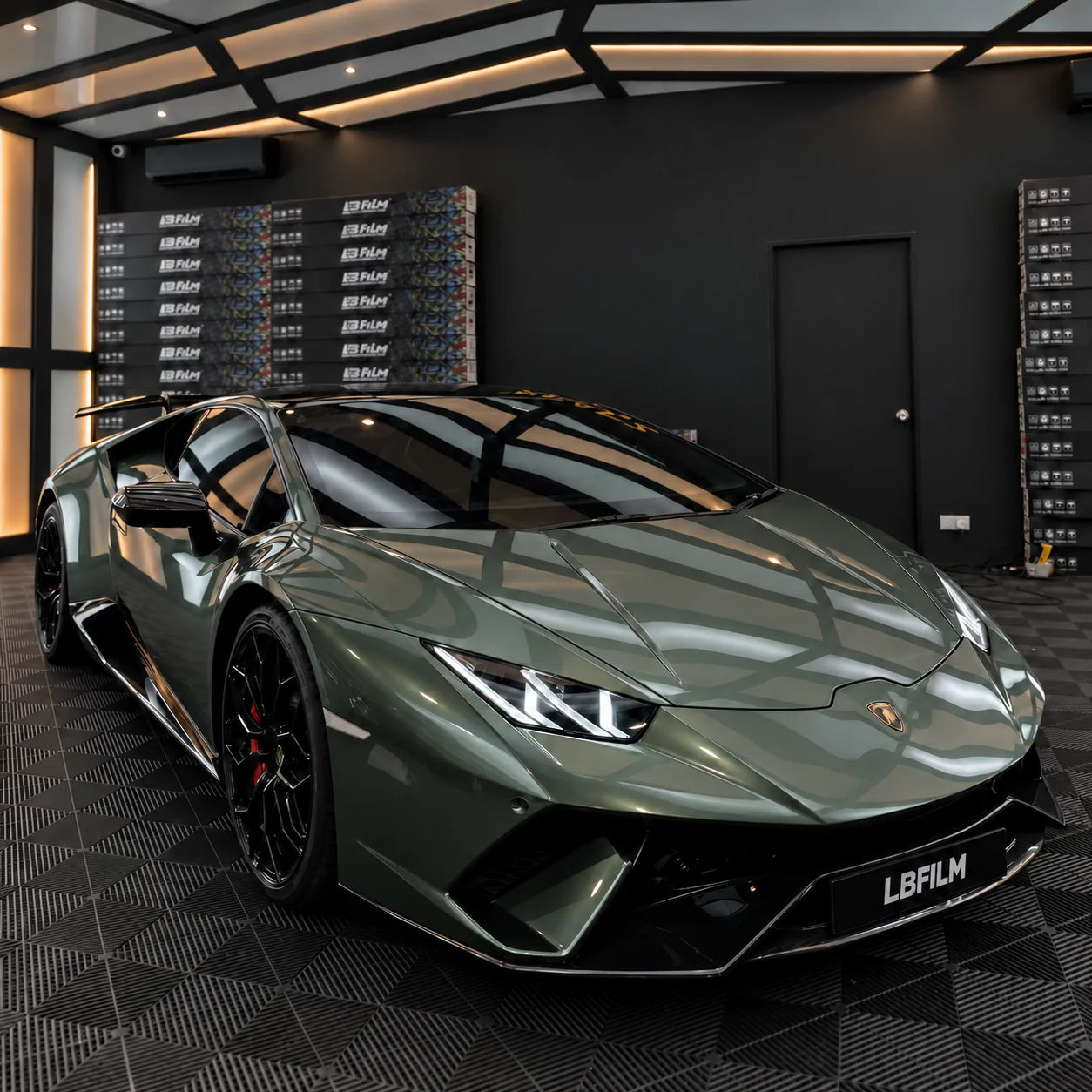 Gloss green Lamborghini Huracán in the LBFILM workshop